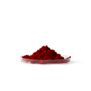 A small mound of bright red astaxanthin powder piled in a shallow clear dish against a plain white background.