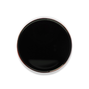 A round black plate or shallow dish viewed from directly above on a plain white background.