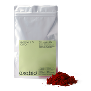 A silver stand-up pouch labeled 'axabio axafine 2.5 OWD' with a pale green label, shown on a white background with a small pile of bright red astaxanthin powder in front.