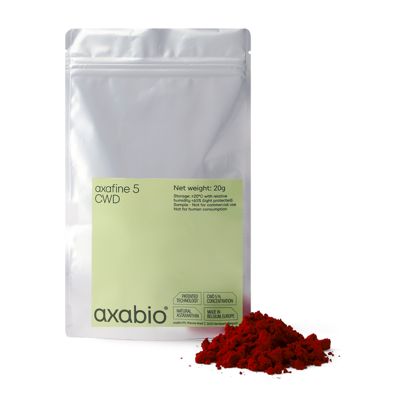 A silver stand-up pouch labeled 'axabio' and 'axafine S CWD' with a pale green front label, shown on a white background with a small pile of bright red powder in front.